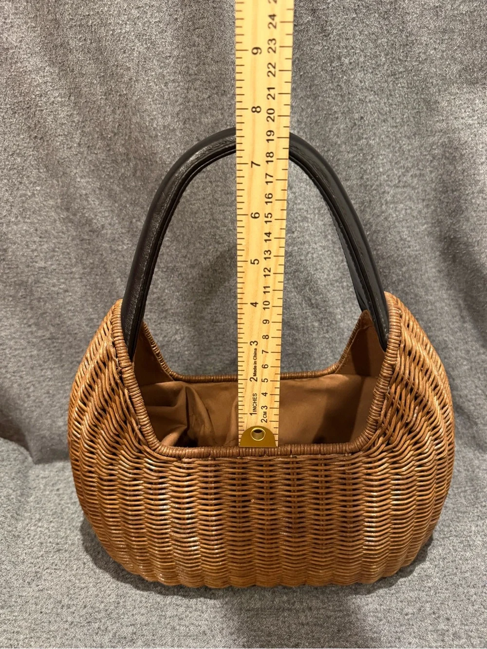 Woven Brown Rattan Basket Handbag w/Black Handles Pre-owned. Good condition